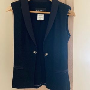 Selling brand-new authentic Chanel vest black with sparkles and pearl buttons .